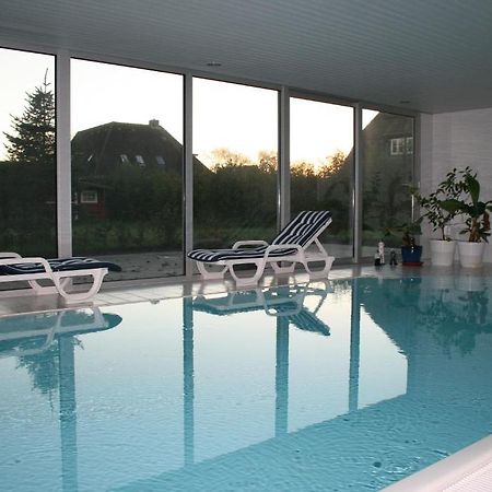 Ferienwohnungen im Hotel garni zur Post Utersum Zimmer foto